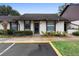 Condo exterior featuring a well-maintained facade and landscaping at 245 Terrace Hill Blvd # 1E, Debary, FL 32713