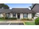 Front view of charming condo with landscaping at 245 Terrace Hill Blvd # 1E, Debary, FL 32713