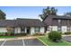 Condo exterior with parking and landscaping at 245 Terrace Hill Blvd # 1E, Debary, FL 32713