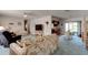 Open living and dining area with a view of the kitchen at 2608 Treehaven Dr, Deltona, FL 32738