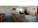 Living room with comfy seating and carpeted floors at 2608 Treehaven Dr, Deltona, FL 32738