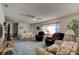 Spacious living room featuring ample seating at 2608 Treehaven Dr, Deltona, FL 32738