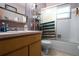 Clean bathroom with shower/tub combo and wood vanity at 262 Valencia Rd, Debary, FL 32713