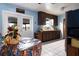 Kitchen with wood cabinets and door leading to backyard at 262 Valencia Rd, Debary, FL 32713