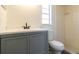 Clean bathroom with gray vanity and shower at 2709 Queen Palm Dr, Edgewater, FL 32141