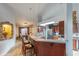 Kitchen features a breakfast bar and ample cabinet space at 2758 Turnbull Cove Dr, New Smyrna Beach, FL 32168