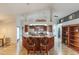 Open kitchen featuring a central island with bar seating and modern appliances at 2758 Turnbull Cove Dr, New Smyrna Beach, FL 32168