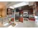 Modern kitchen with stainless steel appliances and granite countertops at 2758 Turnbull Cove Dr, New Smyrna Beach, FL 32168