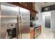 Stainless steel refrigerator with ice and water dispenser in the kitchen at 2758 Turnbull Cove Dr, New Smyrna Beach, FL 32168