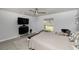 Modern main bedroom with a large television at 2758 Turnbull Cove Dr, New Smyrna Beach, FL 32168