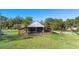 Large metal barn on a spacious property at 3057 Pinelock Dr, Deland, FL 32724