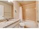 Bathroom featuring tiled shower, granite countertops and white cabinets at 3169 Connemara Dr, Ormond Beach, FL 32174