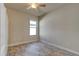 Spacious bedroom with tile flooring and ceiling fan at 3169 Connemara Dr, Ormond Beach, FL 32174