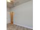 Simple bedroom with neutral walls and tile flooring at 3169 Connemara Dr, Ormond Beach, FL 32174