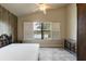 Main bedroom with lake view and large window at 3169 Connemara Dr, Ormond Beach, FL 32174