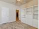 Bedroom with built in shelving and tile flooring at 3169 Connemara Dr, Ormond Beach, FL 32174