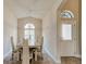 Elegant dining room with a large table and access to other rooms at 3169 Connemara Dr, Ormond Beach, FL 32174