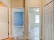 Bright hallway with doors leading to bedrooms and other rooms at 3169 Connemara Dr, Ormond Beach, FL 32174