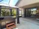 Covered patio featuring a hot tub and gazebo with access to the backyard at 3169 Connemara Dr, Ormond Beach, FL 32174