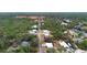 Aerial view of houses and street in a quiet residential neighborhood at 337 Orange Ave, Orange City, FL 32763