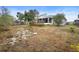 Large backyard with partially fenced yard at 337 Orange Ave, Orange City, FL 32763