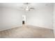 Large bedroom with neutral walls and plush carpeting at 337 Orange Ave, Orange City, FL 32763