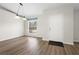 Simple dining area with light walls and wood-look floors at 337 Orange Ave, Orange City, FL 32763