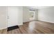 Simple dining area with light walls and wood-look floors at 337 Orange Ave, Orange City, FL 32763