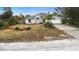 Single-Gathering home with a two-car garage and landscaped yard at 337 Orange Ave, Orange City, FL 32763