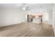 Open living area with kitchen and access to other rooms at 337 Orange Ave, Orange City, FL 32763