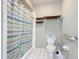 Bathroom with shower, toilet, and a small vanity at 347 Castlewood Ln, New Smyrna Beach, FL 32168