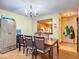 Dining room features a pass through to the kitchen at 347 Castlewood Ln, New Smyrna Beach, FL 32168