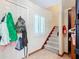 Inviting entryway with staircase and coat closet at 347 Castlewood Ln, New Smyrna Beach, FL 32168