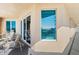 Balcony with ocean view and seating area at 3737 S Atlantic Ave # 504, Daytona Beach, FL 32118