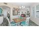 Light and bright dining area with kitchen views at 3737 S Atlantic Ave # 504, Daytona Beach, FL 32118