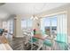 Dining area with light wood table and ocean views at 3737 S Atlantic Ave # 504, Daytona Beach, FL 32118