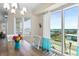 Dining area with water views and a wooden table at 3737 S Atlantic Ave # 504, Daytona Beach, FL 32118