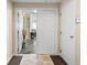 Bright condo entryway with double doors opening to living area at 3737 S Atlantic Ave # 504, Daytona Beach, FL 32118