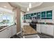 Spacious kitchen with granite island, stainless steel appliances, and ocean view at 3737 S Atlantic Ave # 504, Daytona Beach, FL 32118
