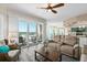 Living room with water views, sectional sofa, and hardwood floors at 3737 S Atlantic Ave # 504, Daytona Beach, FL 32118