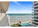 Enjoy breathtaking ocean and pool views from this expansive balcony at 3737 S Atlantic Ave # 504, Daytona Beach, FL 32118