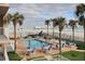 Inviting pool area with ocean views and lounge chairs at 3737 S Atlantic Ave # 504, Daytona Beach, FL 32118