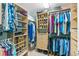 Large walk-in closet with ample shelving and hanging space at 3737 S Atlantic Ave # 504, Daytona Beach, FL 32118