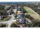 Aerial view of neighborhood and golf course at 428 Hightower Dr, Debary, FL 32713
