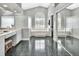 Elegant bathroom with double vanity, soaking tub, and separate shower at 428 Hightower Dr, Debary, FL 32713