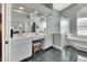 Spacious bathroom with double vanity and large walk-in shower at 428 Hightower Dr, Debary, FL 32713