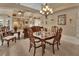 Elegant dining room with a formal table and chairs at 428 Hightower Dr, Debary, FL 32713