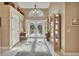 Bright and spacious entryway with decorative items and high ceilings at 428 Hightower Dr, Debary, FL 32713