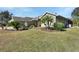 Well-maintained landscaping surrounds this lovely home at 428 Hightower Dr, Debary, FL 32713