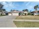 Attractive single-story home with a two-car garage and landscaped yard at 428 Hightower Dr, Debary, FL 32713